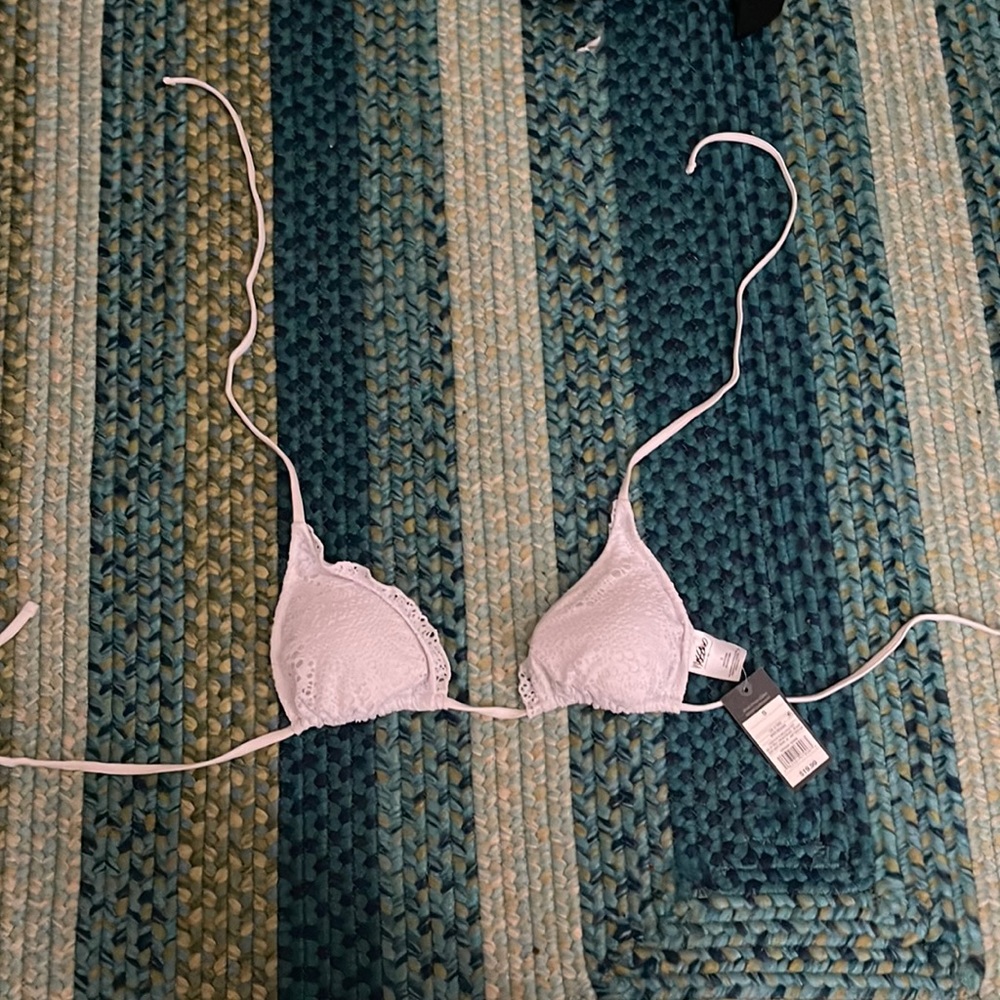 White Crocheted Bikini top. New with Tags. Size small.